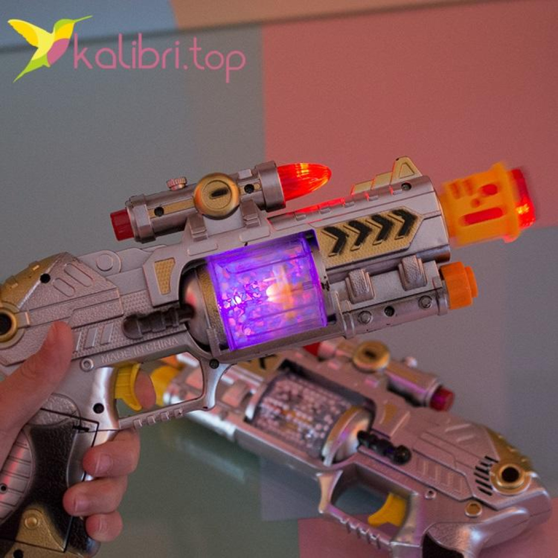 Іграшковий пістолет, що світиться оптом фото 03