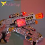 Іграшковий пістолет, що світиться оптом фото 02