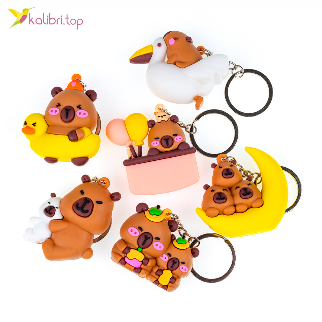 Великі брелоки гумові Капібари дитячі 11,5 см оптом фото 01 Великі брелоки гумові Капібари дитячі 11,5 см оптом фото 01