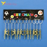 Брелоки Автоматы с глушителем металлические 12 штук оптом фото 01