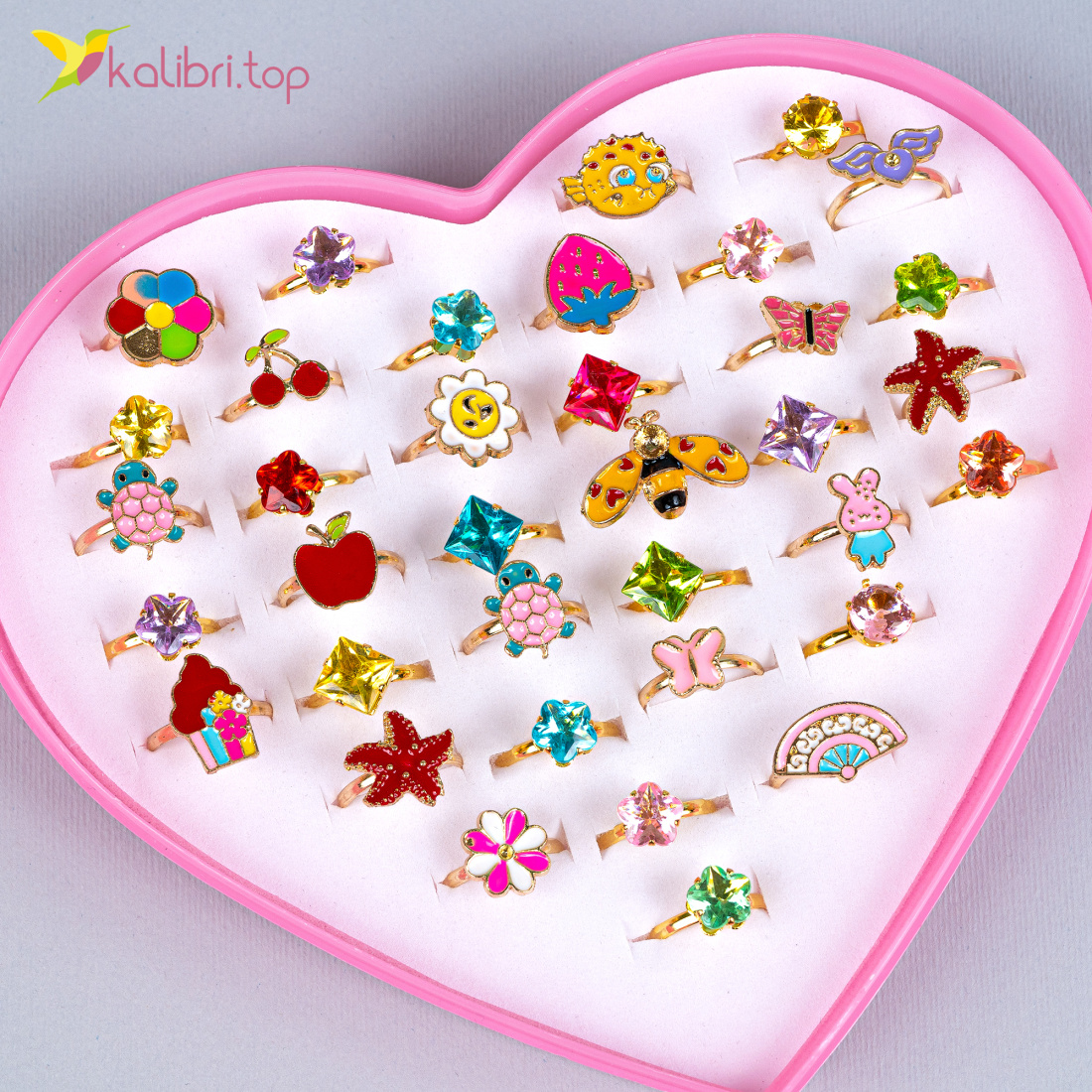 Детские колечки Цветные с колокольчиком оптом фото 01