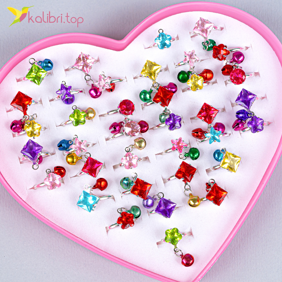 Кільця дитячі Кристал з дзвіночком 36 штук оптом фото 01