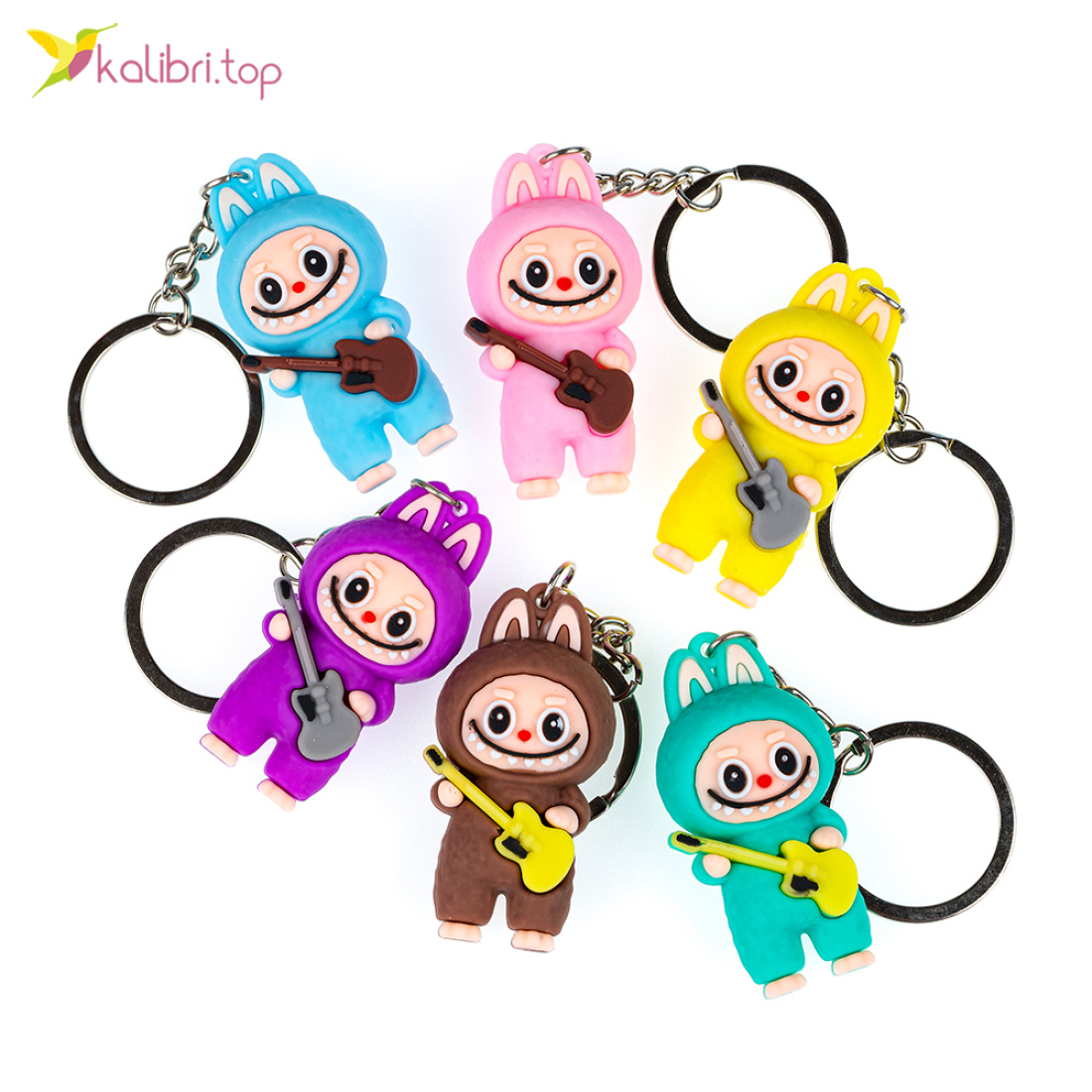 Брелоки дитячі гумові Чудики з гітарою 10 см оптом фото 01 Брелоки дитячі гумові Чудики з гітарою 10 см оптом фото 01